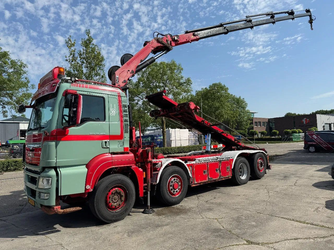 MAN TGS 35.480 8X4 HMF 2420 K5 + HMF ABLE + REMOTE C - Camion ampliroll, Camion grue: photos 2 MAN TGS 35.480 8X4 HMF 2420 K5 + HMF ABLE + REMOTE C - Camion ampliroll, Camion grue: photos 2