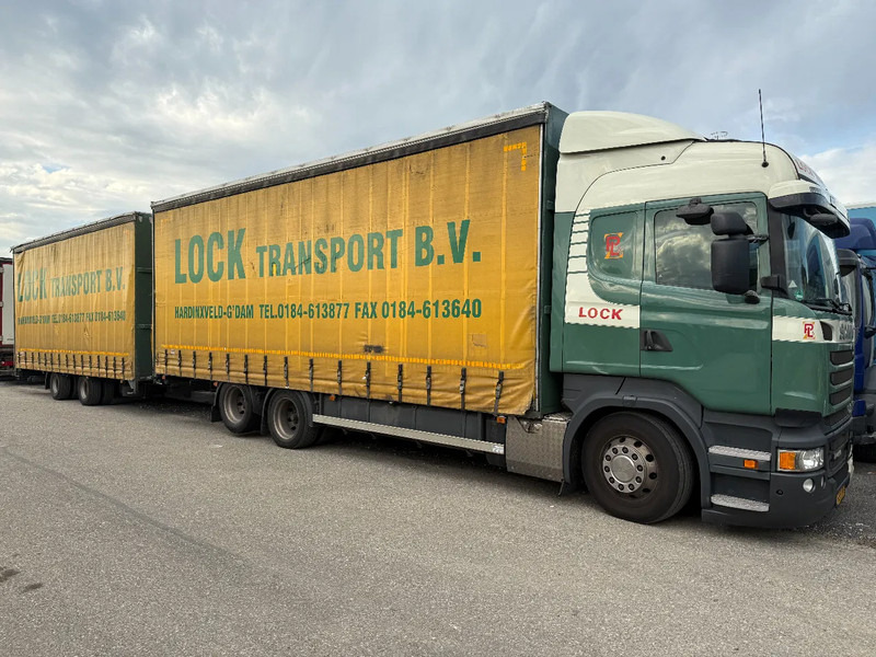 Scania R450 6X2 + DRACO AANHANGER 2010 TUV TILL 17-08-2026 - Camion à rideaux coulissants: photos 1 Scania R450 6X2 + DRACO AANHANGER 2010 TUV TILL 17-08-2026 - Camion à rideaux coulissants: photos 1
