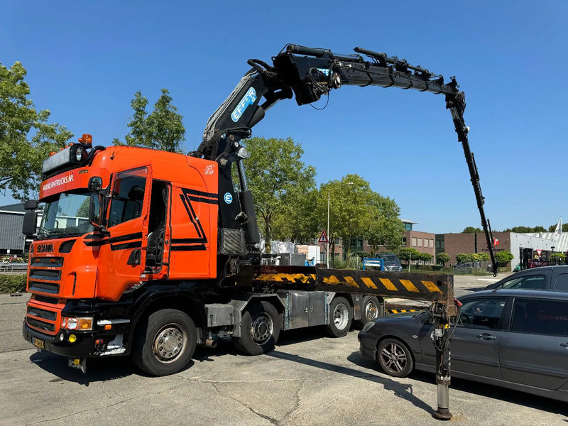 Scania R560 V8 8X2 + EFFER CRANE 1550 6S + FLYJIP 6XHYDR + REMOTE + WINCH - Tracteur routier: photos 1 Scania R560 V8 8X2 + EFFER CRANE 1550 6S + FLYJIP 6XHYDR + REMOTE + WINCH - Tracteur routier: photos 1