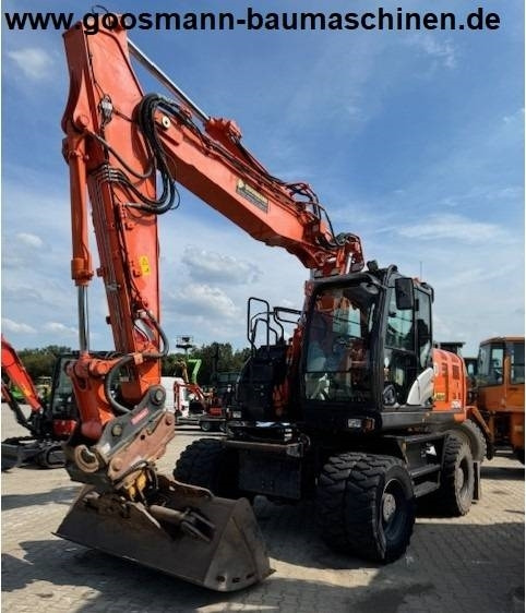 Hitachi ZX 170 W-6 - Pelle sur pneus: photos 1 Hitachi ZX 170 W-6 - Pelle sur pneus: photos 1