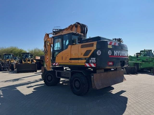 Hyundai HW 210 - Pelle sur pneus: photos 1 Hyundai HW 210 - Pelle sur pneus: photos 1