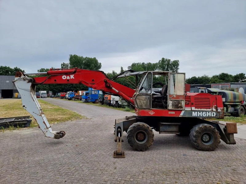 O & K MH6HD - Pelle sur pneus: photos 1 O & K MH6HD - Pelle sur pneus: photos 1