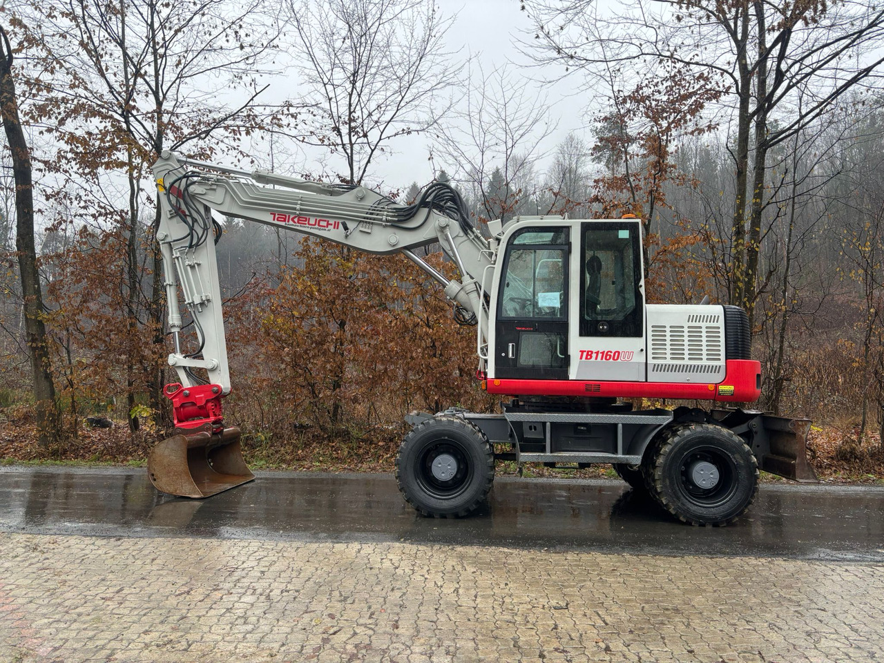 TAKEUCHI TB 1160 W - Pelle sur pneus: photos 1 TAKEUCHI TB 1160 W - Pelle sur pneus: photos 1