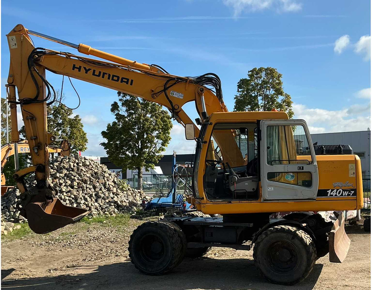 Hyundai Robex140W-7 - Pelle sur pneus: photos 2 Hyundai Robex140W-7 - Pelle sur pneus: photos 2