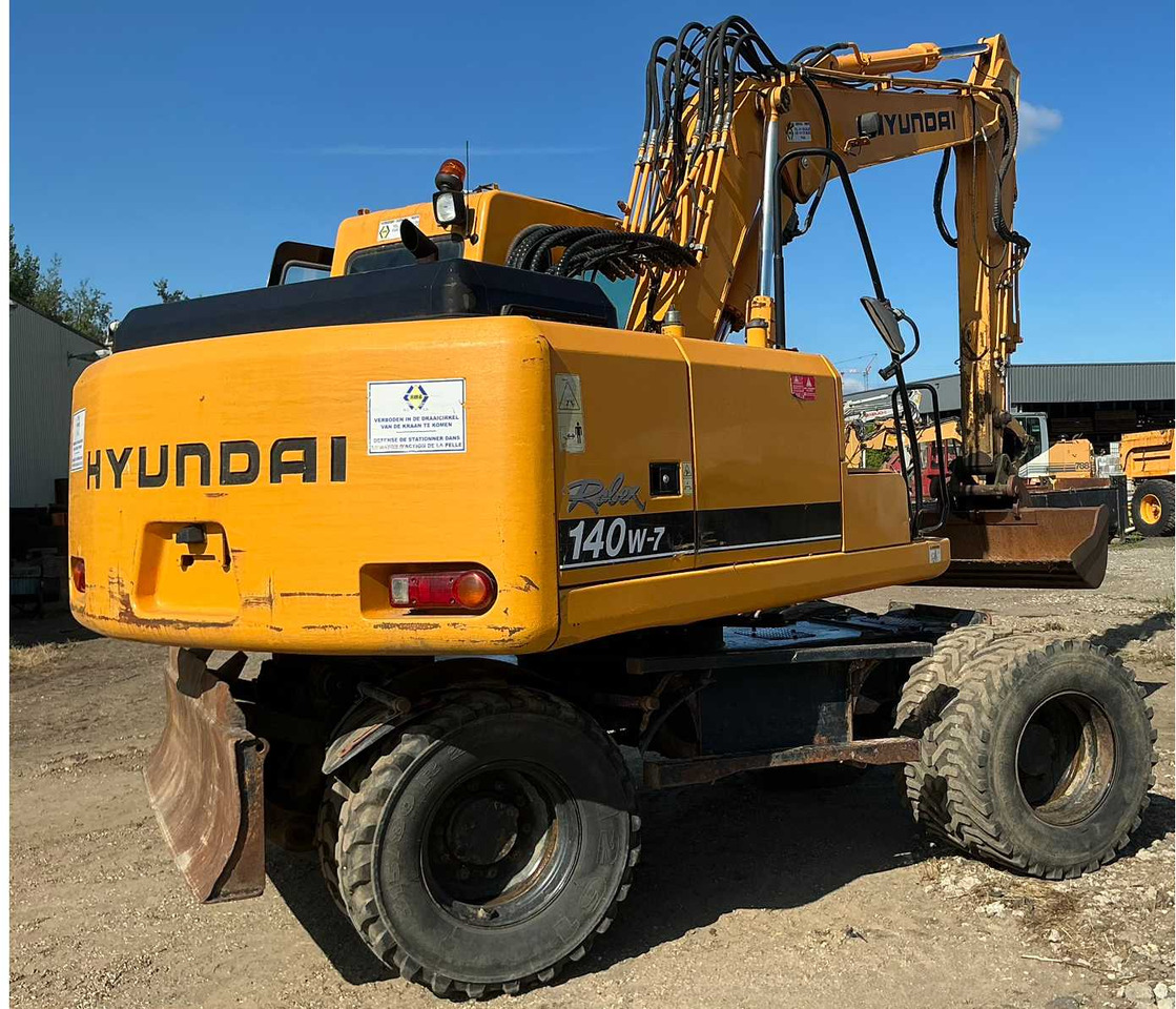 Hyundai Robex140W-7 - Pelle sur pneus: photos 5 Hyundai Robex140W-7 - Pelle sur pneus: photos 5