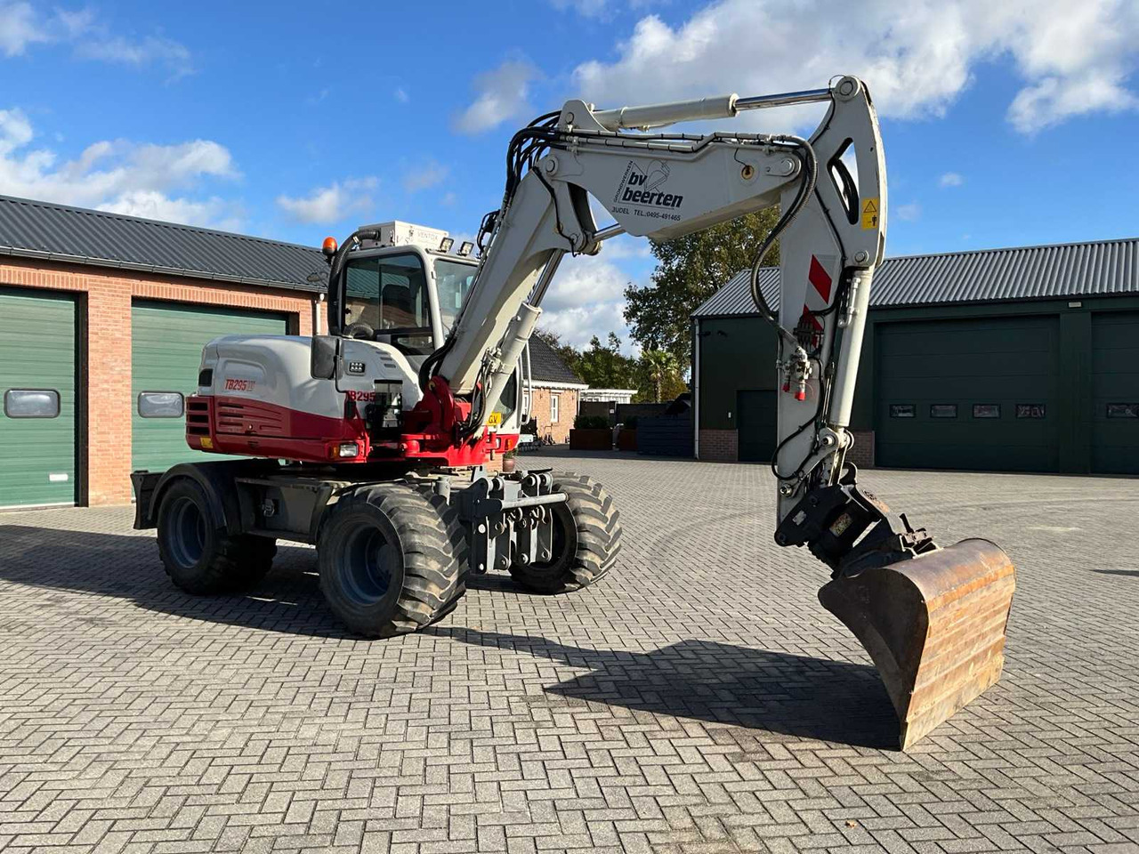 Takeuchi 2015 TAKEUCHI TB295W WHEELED EXCAVATOR - Pelle sur pneus: photos 2 Takeuchi 2015 TAKEUCHI TB295W WHEELED EXCAVATOR - Pelle sur pneus: photos 2
