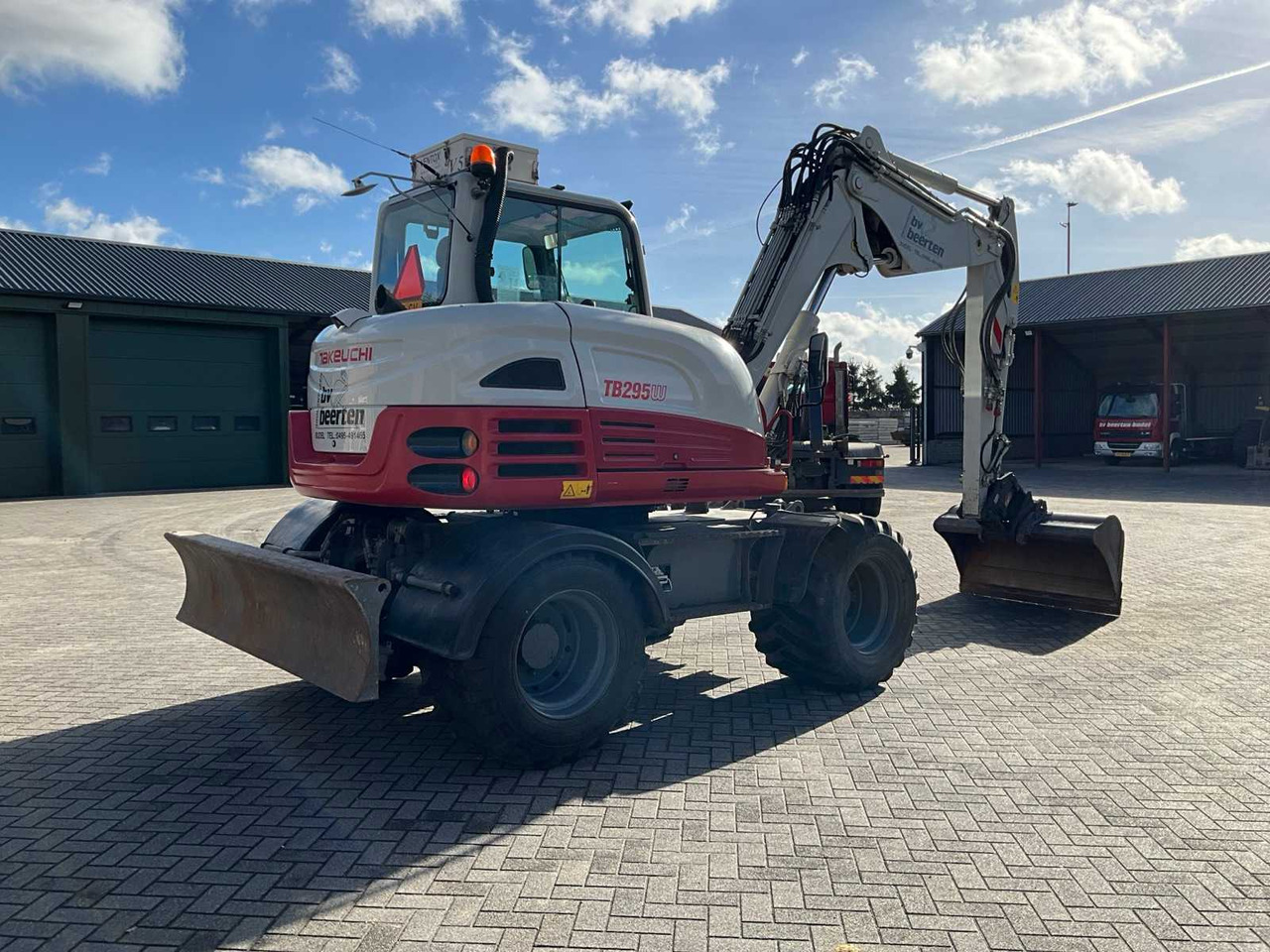 Takeuchi 2015 TAKEUCHI TB295W WHEELED EXCAVATOR - Pelle sur pneus: photos 3 Takeuchi 2015 TAKEUCHI TB295W WHEELED EXCAVATOR - Pelle sur pneus: photos 3