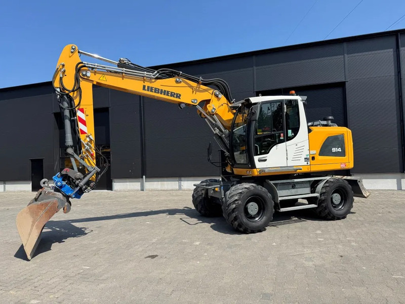 Liebherr A914 2019 7300 uur !! NL MACHINE !! - Pelle sur pneus: photos 2 Liebherr A914 2019 7300 uur !! NL MACHINE !! - Pelle sur pneus: photos 2