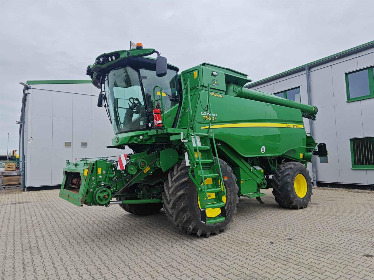 John Deere T560 Hillmaster - Moissonneuse-batteuse: photos 1 John Deere T560 Hillmaster - Moissonneuse-batteuse: photos 1