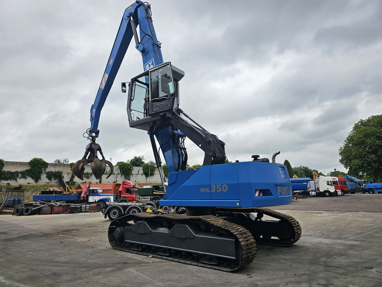 Fuchs RHL 350 Materialhandler With Adjustable Tracks - Pelle de manutention: photos 4 Fuchs RHL 350 Materialhandler With Adjustable Tracks - Pelle de manutention: photos 4
