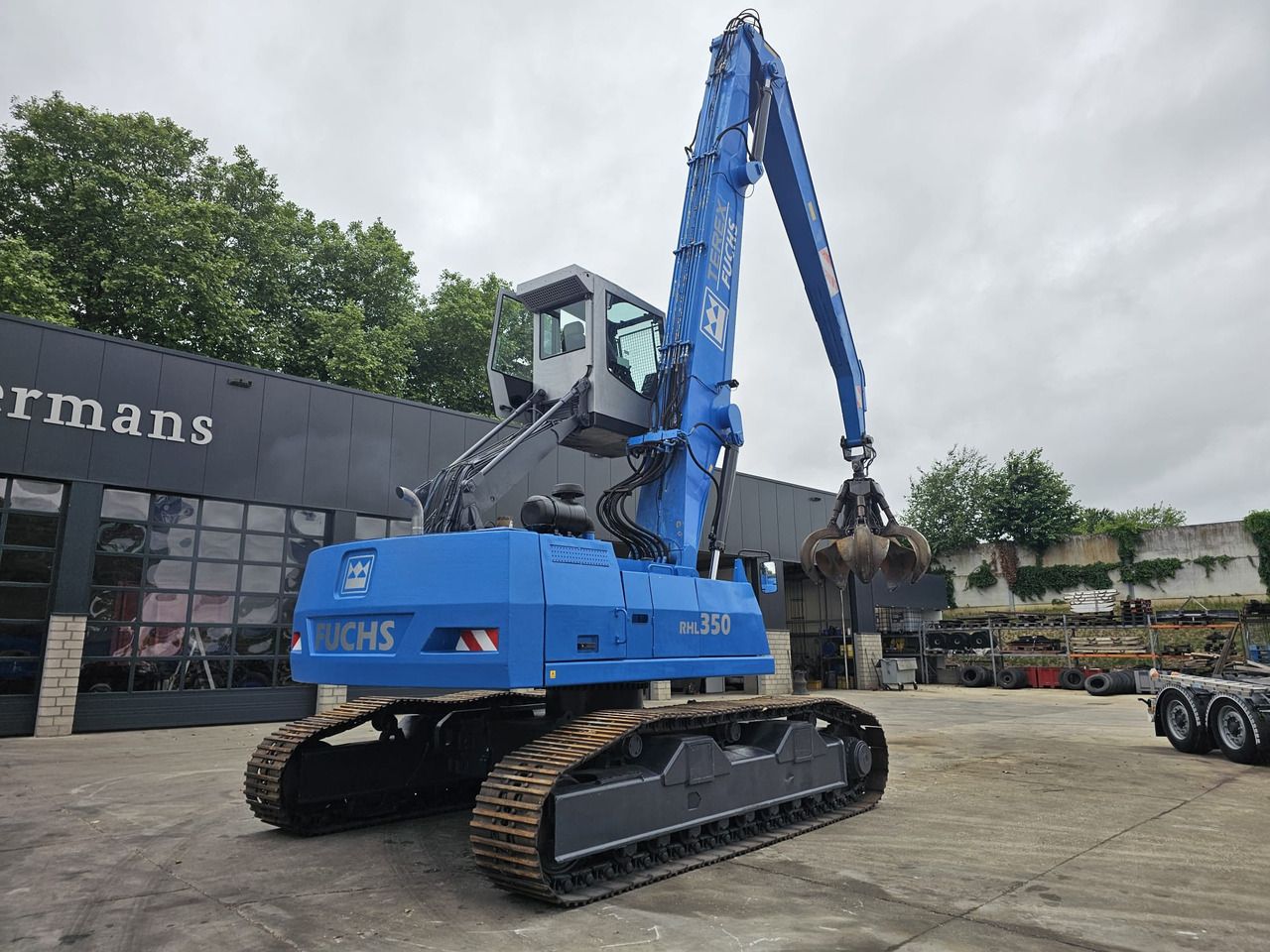 Pelle de manutention Fuchs RHL 350 Materialhandler With Adjustable Tracks: photos 8