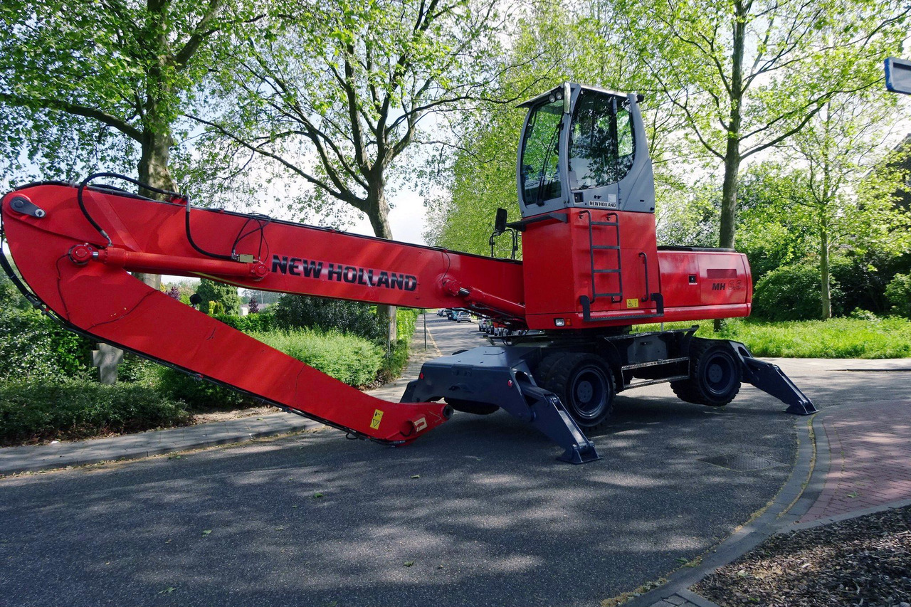 New Holland MH 6.6 Materialhandler With Magnet System - Pelle de manutention: photos 4 New Holland MH 6.6 Materialhandler With Magnet System - Pelle de manutention: photos 4