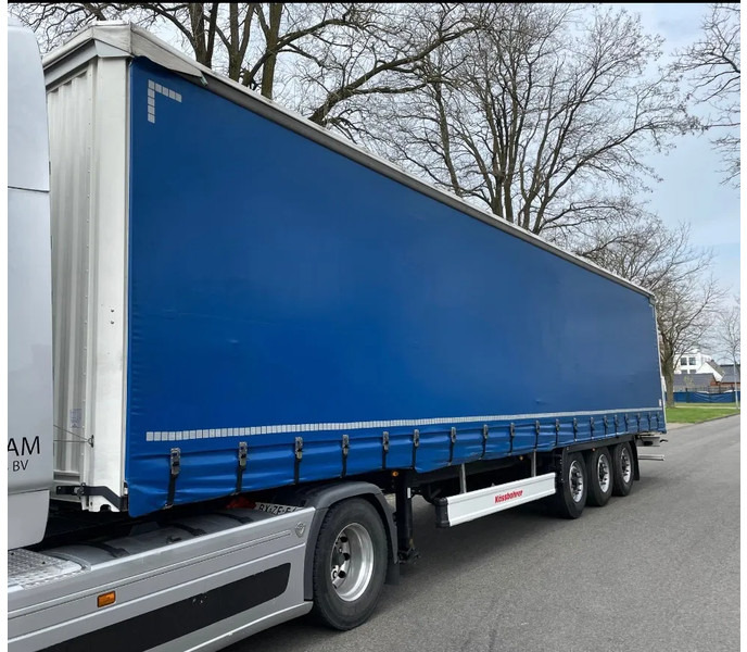 Kässbohrer Trailer heeft nu laadklep 2000 KG - Semi-remorque rideaux coulissants: photos 1 Kässbohrer Trailer heeft nu laadklep 2000 KG - Semi-remorque rideaux coulissants: photos 1
