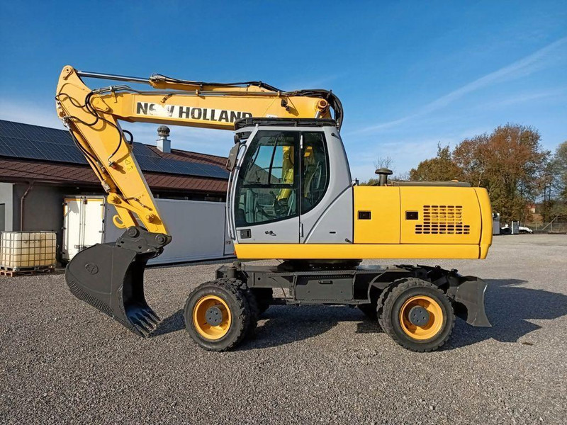 New Holland WE 190 - Pelle sur pneus: photos 2 New Holland WE 190 - Pelle sur pneus: photos 2