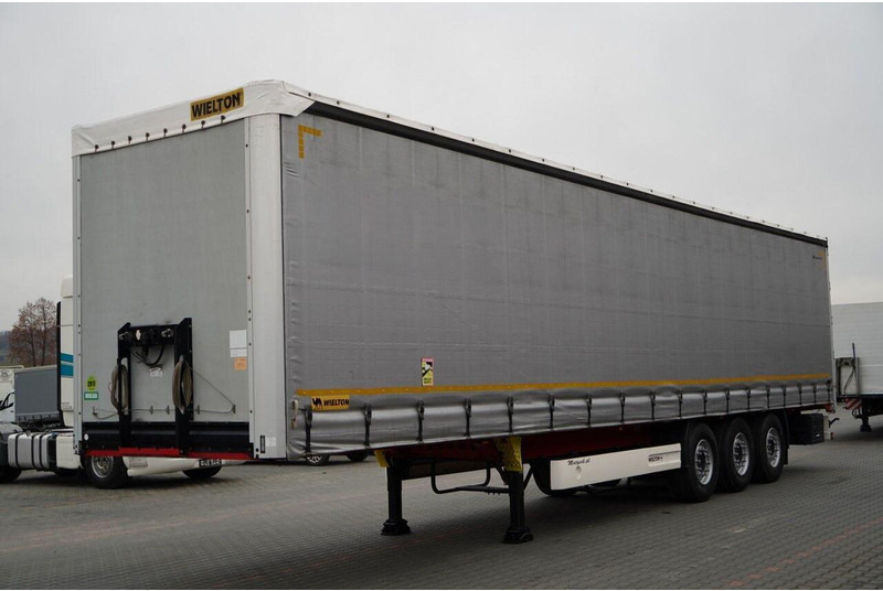 Wielton FIRANKA STANDARD / MULDA DO STALI - 9 M / OŚ PODNOSZONA / SAF / - Semi-remorque rideaux coulissants: photos 1 Wielton FIRANKA STANDARD / MULDA DO STALI - 9 M / OŚ PODNOSZONA / SAF / - Semi-remorque rideaux coulissants: photos 1