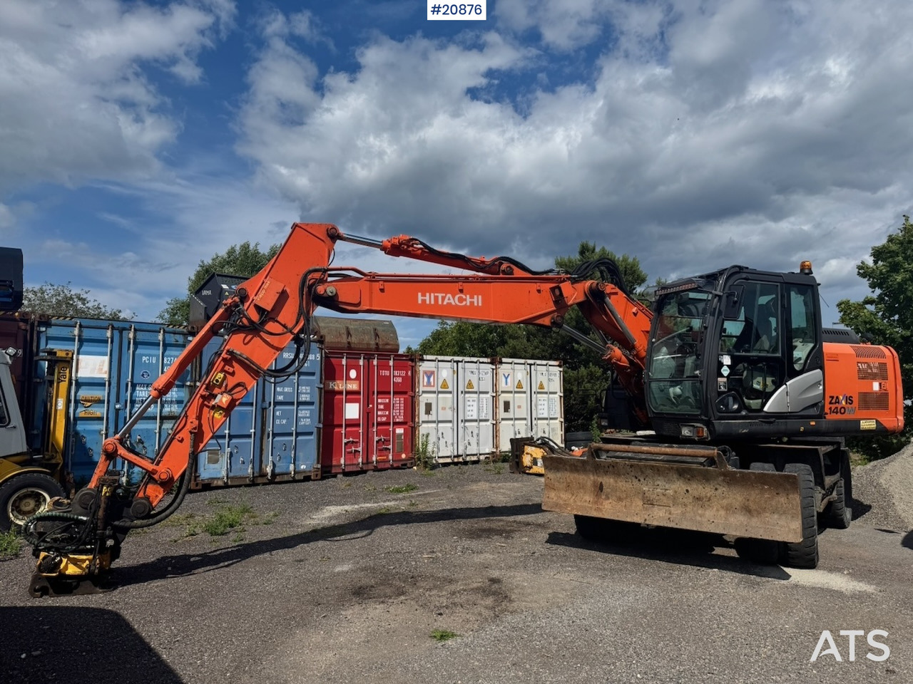 Hitachi ZX140W-5B - Pelle sur pneus: photos 1 Hitachi ZX140W-5B - Pelle sur pneus: photos 1