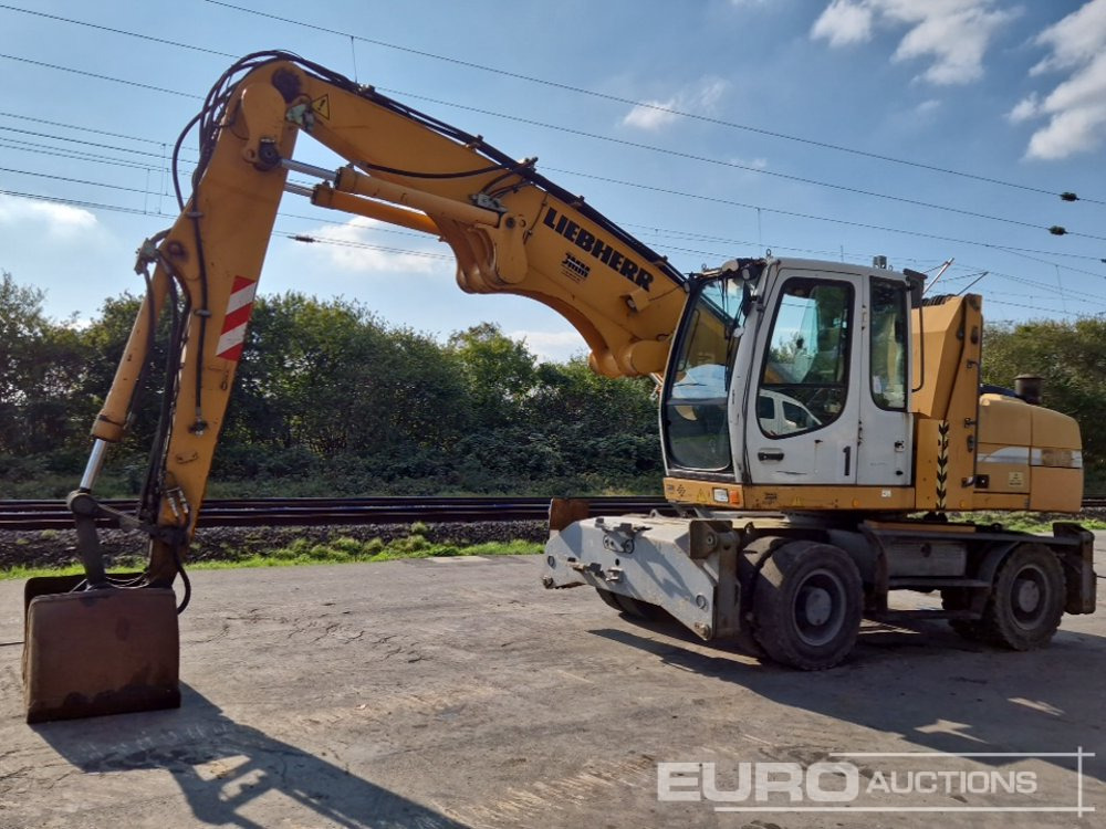 Liebherr A316 LITRONIC - Pelle sur pneus: photos 1 Liebherr A316 LITRONIC - Pelle sur pneus: photos 1