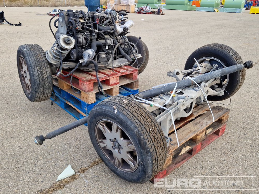 Pallet of Volvo XC70 Spares including Axles, Tyres, Engine components - Matériel de chantier: photos 1 Pallet of Volvo XC70 Spares including Axles, Tyres, Engine components - Matériel de chantier: photos 1