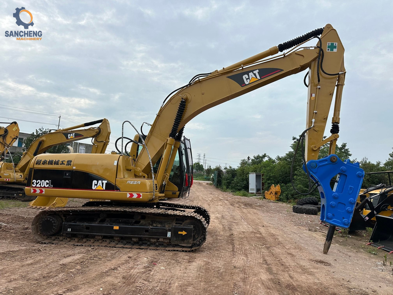 CAT 320CL with hammer - Pelle sur chenille: photos 2 CAT 320CL with hammer - Pelle sur chenille: photos 2