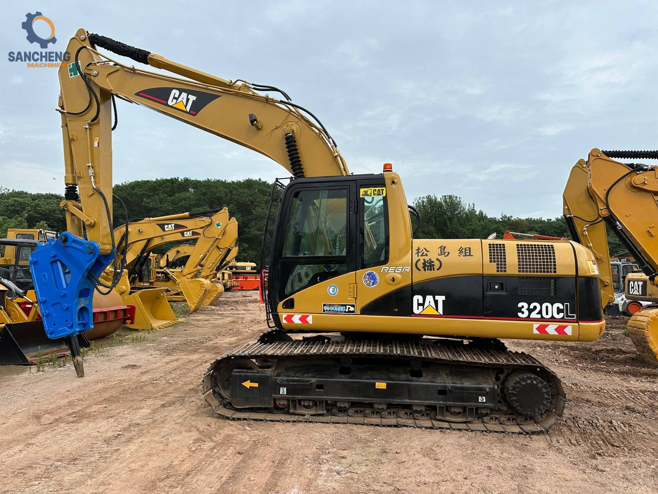 CAT 320CL with hammer - Pelle sur chenille: photos 1 CAT 320CL with hammer - Pelle sur chenille: photos 1