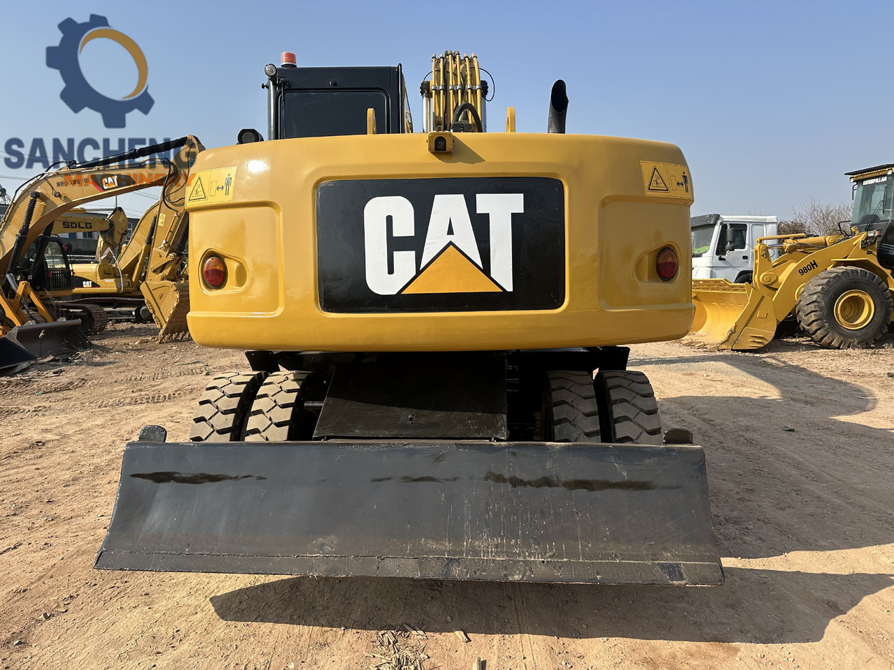 CATERPILLAR M320D2 - Pelle sur pneus: photos 3 CATERPILLAR M320D2 - Pelle sur pneus: photos 3