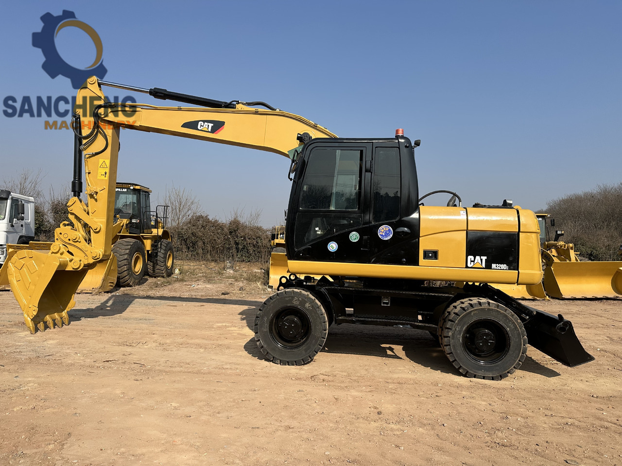 CATERPILLAR M320D2 - Pelle sur pneus: photos 4 CATERPILLAR M320D2 - Pelle sur pneus: photos 4