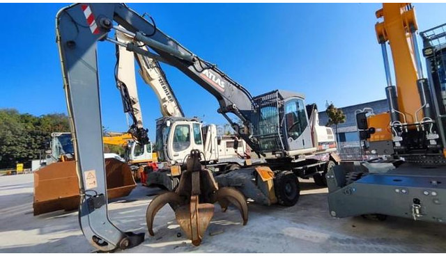 Atlas TW270 - Pelle sur pneus: photos 1 Atlas TW270 - Pelle sur pneus: photos 1