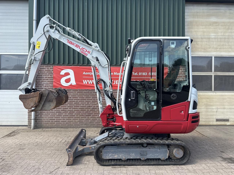 Takeuchi Kraan TB230 - Gebruikt - Mini pelle: photos 1 Takeuchi Kraan TB230 - Gebruikt - Mini pelle: photos 1