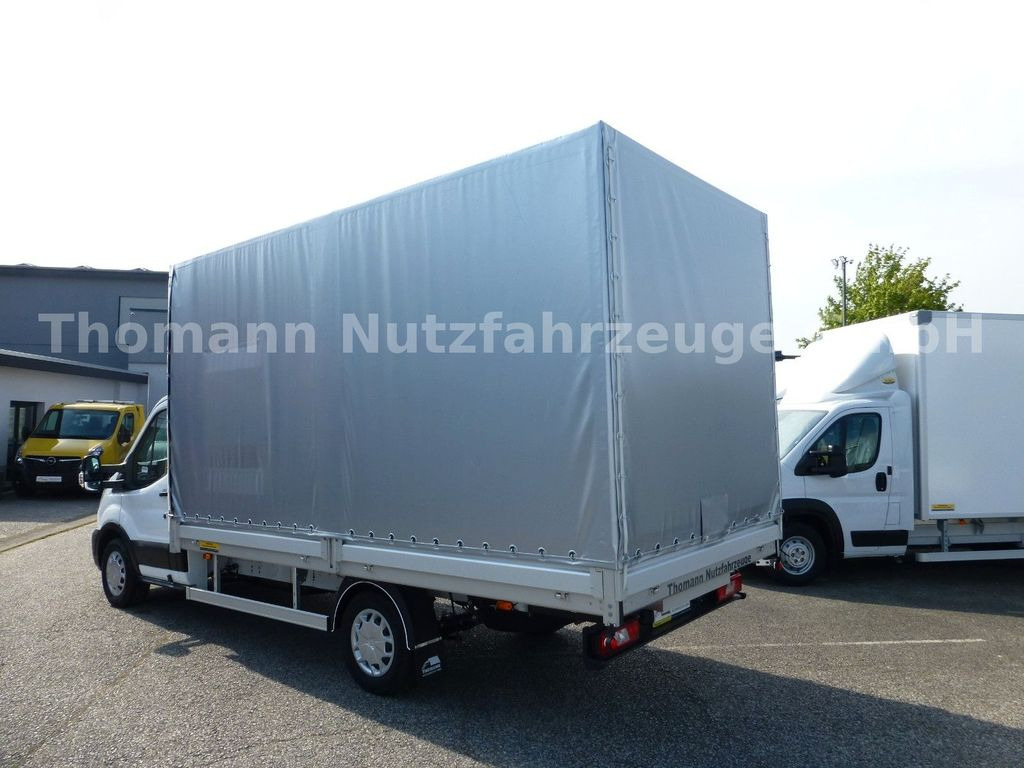 Ford Transit Pritsche Plane 4,25m Klima Temp. DAB Ford Transit Pritsche Plane 4,25m Klima Temp. DAB - Utilitaire rideaux coulissants (PLSC): photos 5 Ford Transit Pritsche Plane 4,25m Klima Temp. DAB Ford Transit Pritsche Plane 4,25m Klima Temp. DAB - Utilitaire rideaux coulissants (PLSC): photos 5
