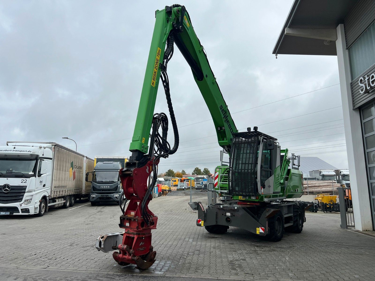 Sennebogen 718 / inkl. Vosch Fällzange / nur 1.965h! - Pelle sur pneus: photos 5 Sennebogen 718 / inkl. Vosch Fällzange / nur 1.965h! - Pelle sur pneus: photos 5