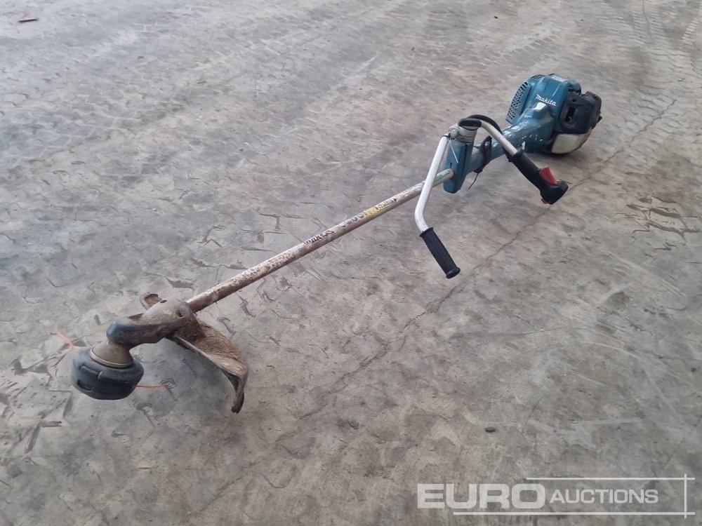 Makita Petrol Strimmer - Équipement de garage: photos 1 Makita Petrol Strimmer - Équipement de garage: photos 1