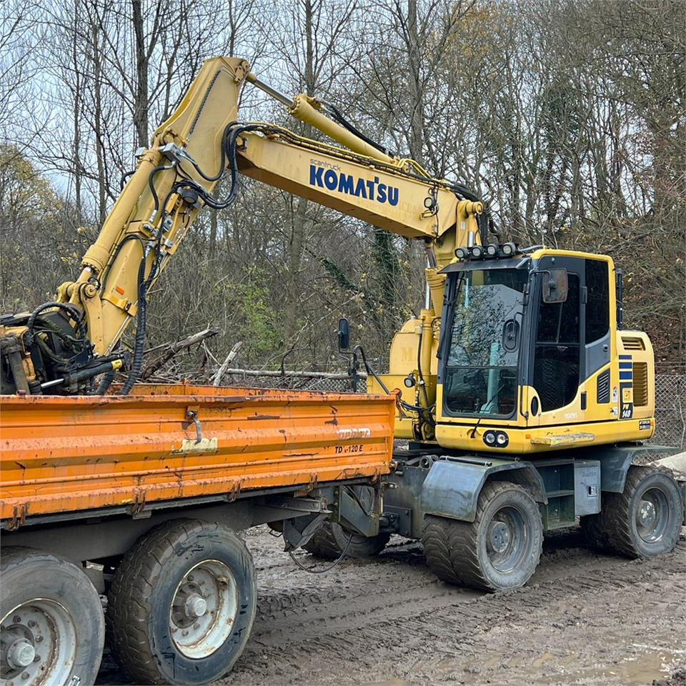 Komatsu PW148-10 - Pelle sur pneus: photos 3 Komatsu PW148-10 - Pelle sur pneus: photos 3