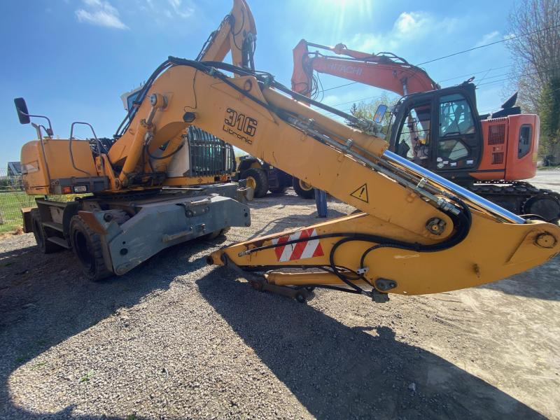 Liebherr A316Litronic - Pelle sur pneus: photos 3 Liebherr A316Litronic - Pelle sur pneus: photos 3
