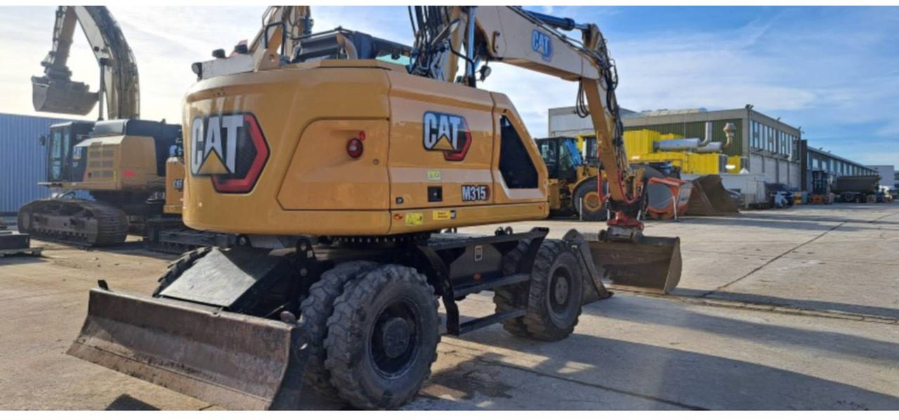 CAT M315-07 - Pelle sur pneus: photos 3 CAT M315-07 - Pelle sur pneus: photos 3