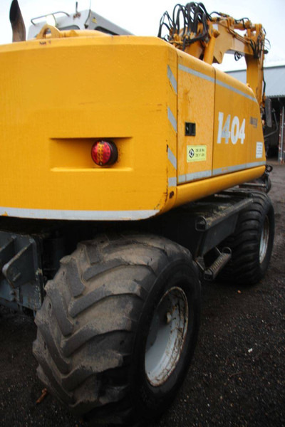 Atlas 1404 - Pelle sur pneus: photos 5 Atlas 1404 - Pelle sur pneus: photos 5