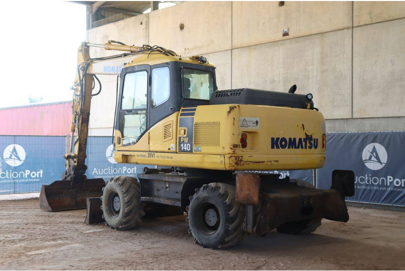 Komatsu PW140-7 - Pelle sur pneus: photos 3 Komatsu PW140-7 - Pelle sur pneus: photos 3