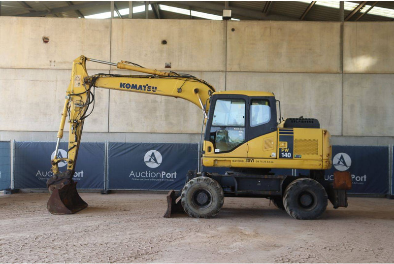 Komatsu PW140-7 - Pelle sur pneus: photos 2 Komatsu PW140-7 - Pelle sur pneus: photos 2