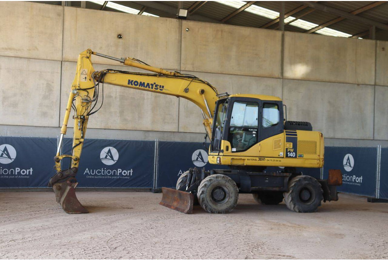 Komatsu PW140-7 - Pelle sur pneus: photos 1 Komatsu PW140-7 - Pelle sur pneus: photos 1