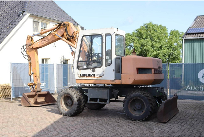 Liebherr A 310 - Pelle sur pneus: photos 3 Liebherr A 310 - Pelle sur pneus: photos 3