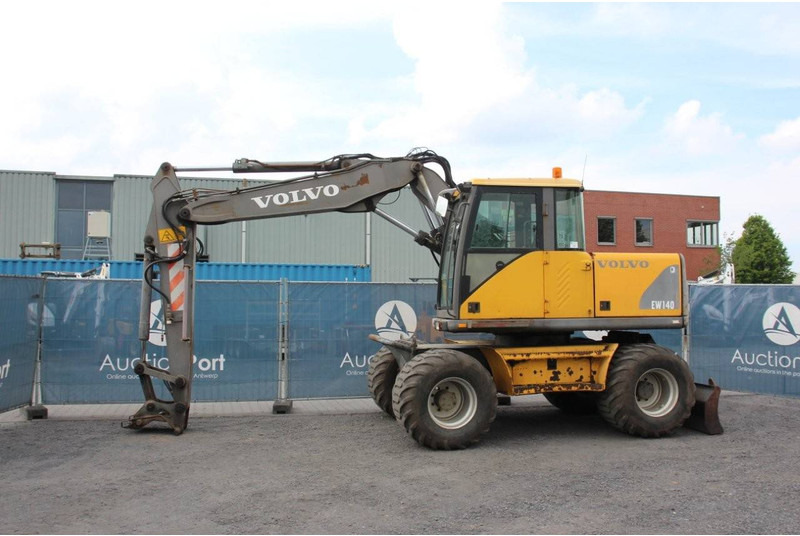 Volvo EW 140 - Pelle sur pneus: photos 1 Volvo EW 140 - Pelle sur pneus: photos 1