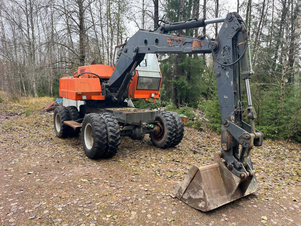 Atlas 1202 - Pelle sur pneus: photos 3 Atlas 1202 - Pelle sur pneus: photos 3