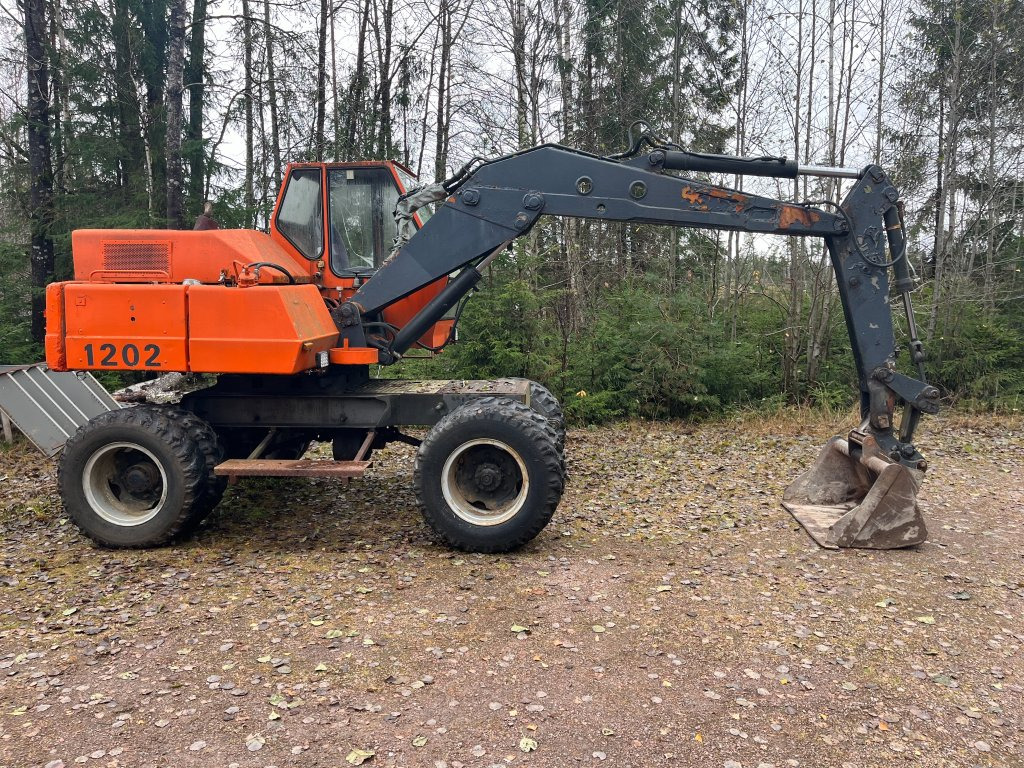 Atlas 1202 - Pelle sur pneus: photos 4 Atlas 1202 - Pelle sur pneus: photos 4