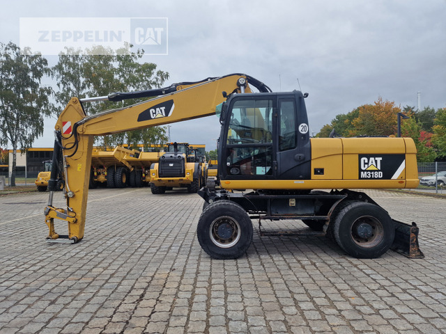 Cat M318D - Pelle sur pneus: photos 3 Cat M318D - Pelle sur pneus: photos 3