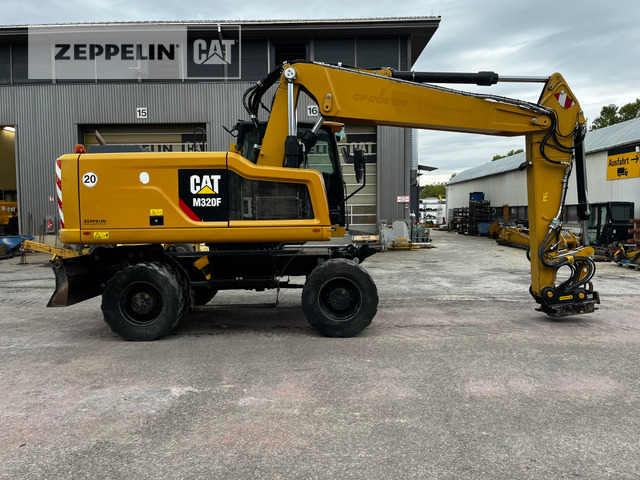 Cat M320F - Pelle sur pneus: photos 5 Cat M320F - Pelle sur pneus: photos 5
