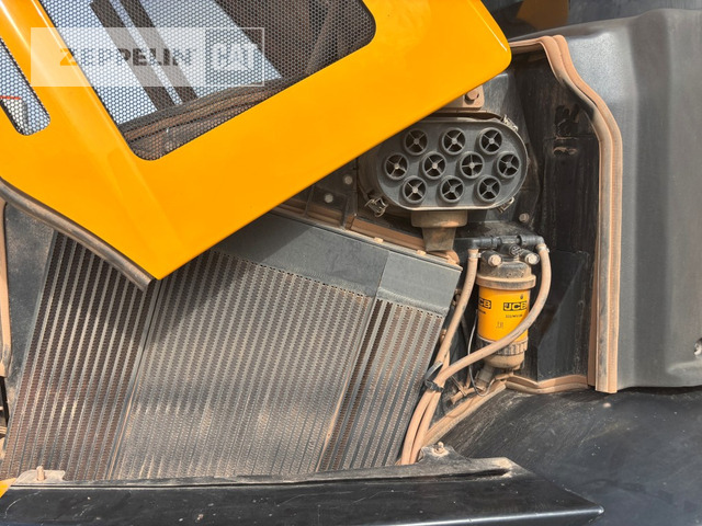 Chargeuse sur pneus Jcb 409: photos 26