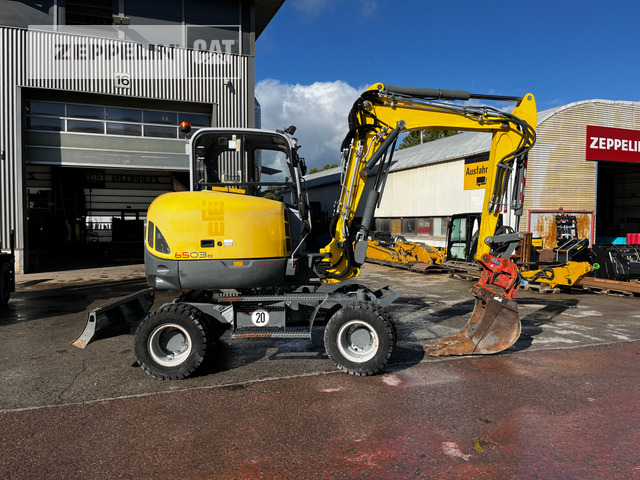 Neuson 6503 - Pelle sur pneus: photos 5 Neuson 6503 - Pelle sur pneus: photos 5