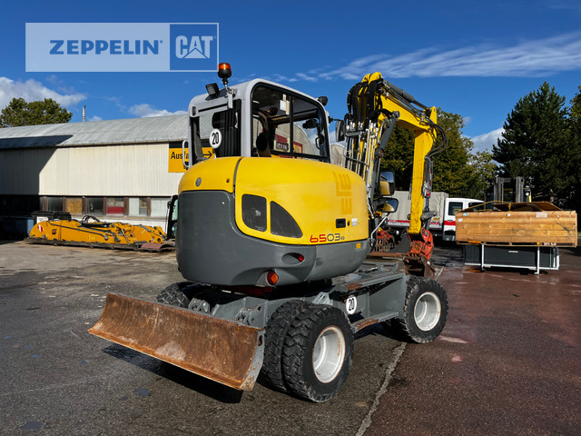 Neuson 6503 - Pelle sur pneus: photos 4 Neuson 6503 - Pelle sur pneus: photos 4