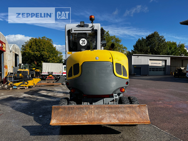 Neuson 6503 - Pelle sur pneus: photos 3 Neuson 6503 - Pelle sur pneus: photos 3