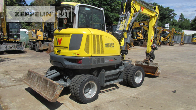 Wacker EW65 - Pelle sur pneus: photos 1 Wacker EW65 - Pelle sur pneus: photos 1