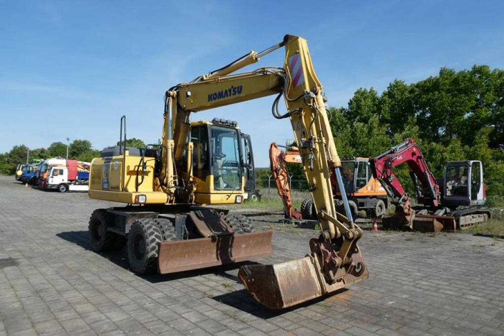 KOMATSU HANOMAG Mobilbagger PW140-7 Mobilbagger - Pelle sur pneus: photos 1 KOMATSU HANOMAG Mobilbagger PW140-7 Mobilbagger - Pelle sur pneus: photos 1